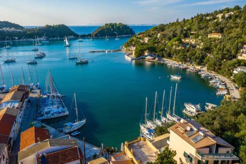 an aerial view of a harbor with boats in the water at Lakka Seaview Apartments by Konnect in Lákka