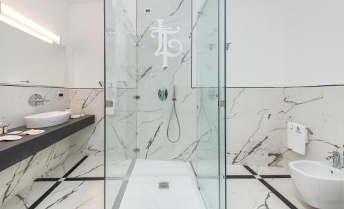 a bathroom with a shower and a sink at Villa Le Terrazze Charming Rooms in Taormina