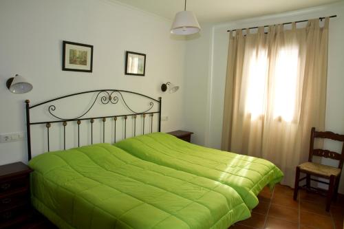 Ein Bett oder Betten in einem Zimmer der Unterkunft Rotacapa