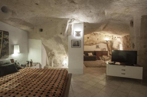 A bed or beds in a room at Residence San Pietro Barisano