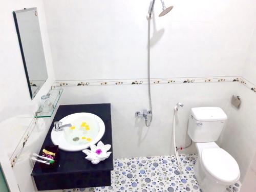 Vonios kambarys apgyvendinimo įstaigoje Minh Khoi Guest House