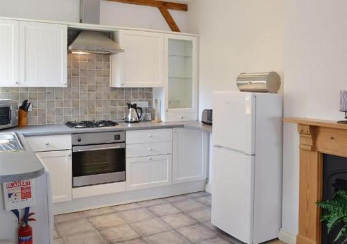 Kuchyň nebo kuchyňský kout v ubytování Penmorvah Manor Hotel