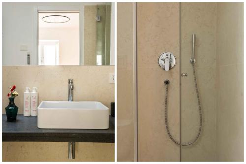 Ванна кімната в Magione Apartment with Terrace by Wonderful Italy