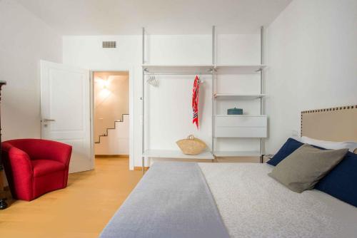 Posteľ alebo postele v izbe v ubytovaní Magione Apartment with Terrace by Wonderful Italy