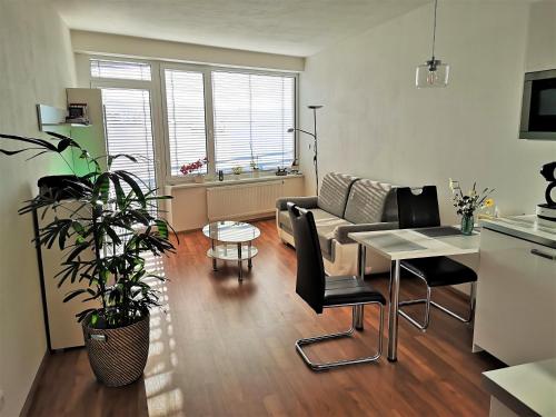 Televízia a/alebo spoločenská miestnosť v ubytovaní New apartment with garage parking