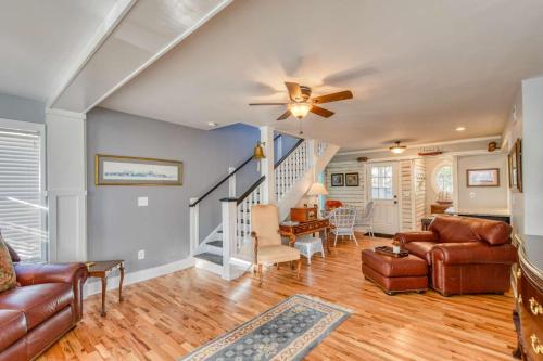 a living room with a couch and a ceiling fan at 1 Fletcher Ln in St. Augustine