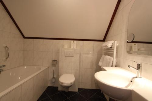 Ένα μπάνιο στο Hotel De Torenhoeve