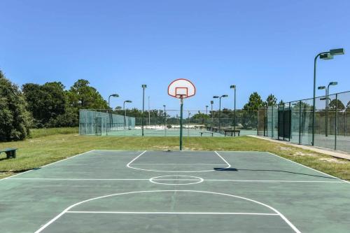 a basketball court with a hoop in a park at Gulf Shores Plantation #1262 in Gulf Shores