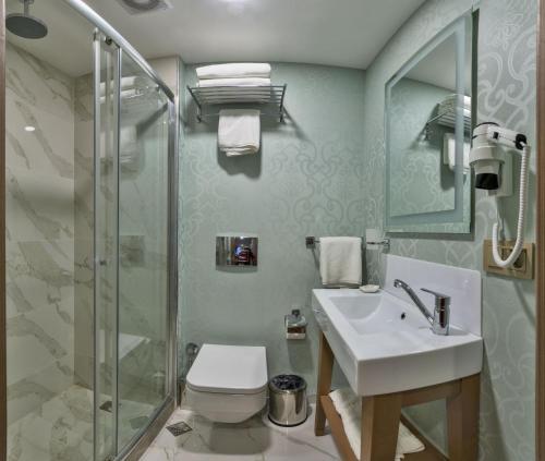 Vonios kambarys apgyvendinimo įstaigoje Taximist Hotel