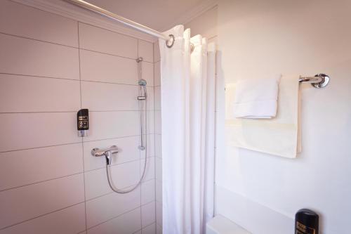 Ett badrum på Hotel Spies