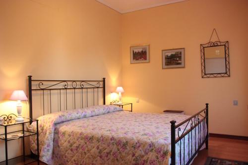 Postel nebo postele na pokoji v ubytování B&B I Narcisi