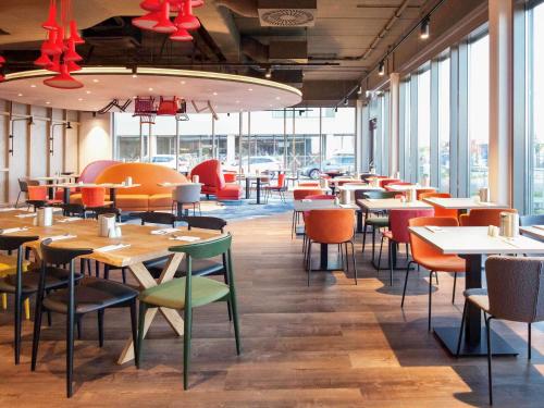Reštaurácia alebo iné gastronomické zariadenie v ubytovaní ibis Styles Parndorf Neusiedler See
