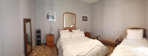 Ein Bett oder Betten in einem Zimmer der Unterkunft Sunseeker Lodge