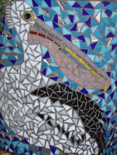 a mosaic image of a peacock on a window at Pelican Lodge Guesthouse in Sedgefield