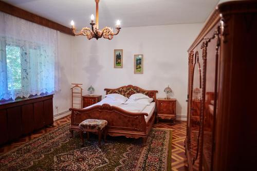 Ένα ή περισσότερα κρεβάτια σε δωμάτιο στο Kormos Residence