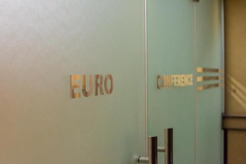 a door with a herpes sign on the side of it at Euro Hotel and Apartments in Dar es Salaam