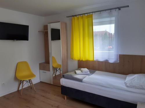 Voodi või voodid majutusasutuse SZWEDZKA22 PL Premium Rooms toas
