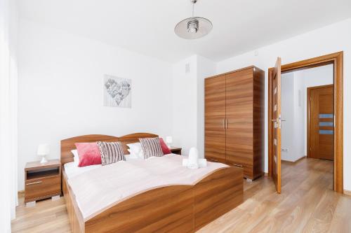 Posteľ alebo postele v izbe v ubytovaní Apartament Szarotka Kierpcówka 16 Kościelisko by Noclegi Renters