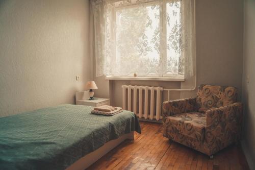 Tempat tidur dalam kamar di Hotell Pääsuke