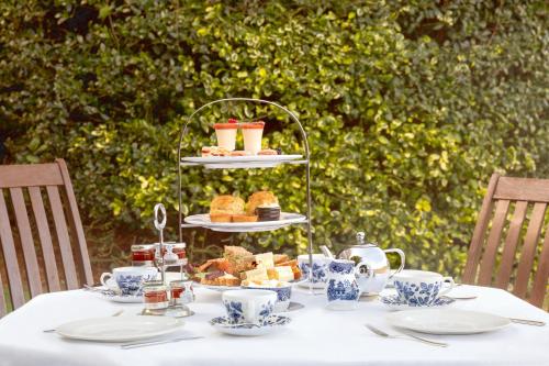 a table with a plate of pastries on a table at Holiday Inn Dover by IHG in Dover