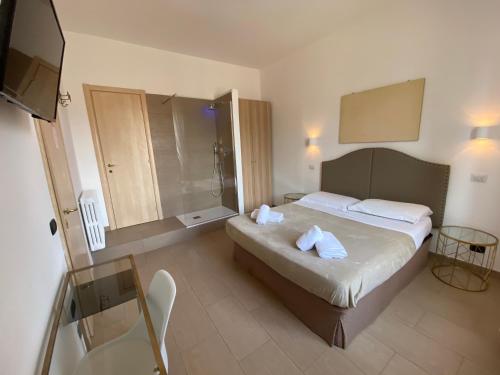 Postel nebo postele na pokoji v ubytování Art Atelier Vaticano Guest House