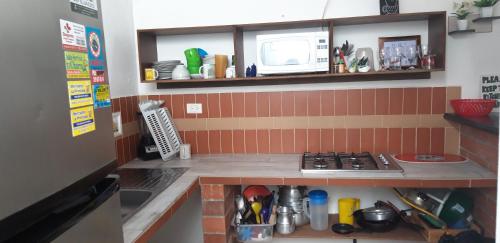 A cozinha ou cozinha compacta de Hostal Balcones de la Piedra
