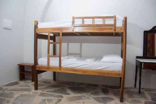 Dviaukštė lova arba lovos apgyvendinimo įstaigoje Pousada Porto das Barcas
