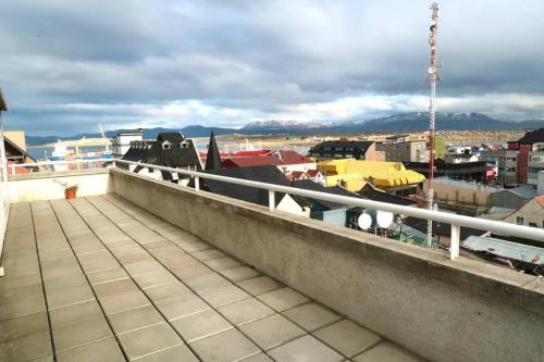 a balcony with a view of a city at Lo de Moli 5A in Ushuaia