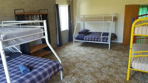 מיטה או מיטות בחדר ב-Hillocks Drive