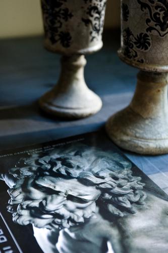 a group of vases sitting on a table at Casa Montani in Rome