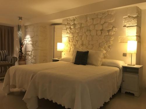 Ένα ή περισσότερα κρεβάτια σε δωμάτιο στο Apartamentos Ebro Reinosa