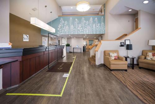 a lobby of a hospital with chairs and a waiting room at Sleep Inn & Suites Port Clinton in Port Clinton