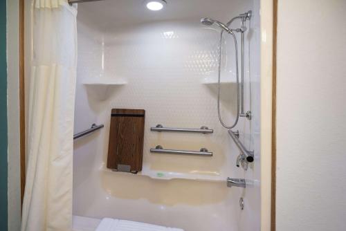 A bathroom at Sleep Inn & Suites