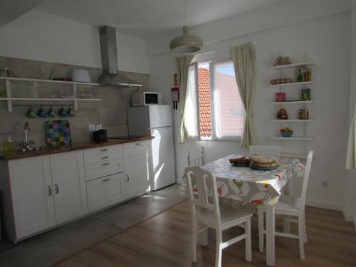 Dapur atau dapur kecil di A Mansão do Mé-Mé