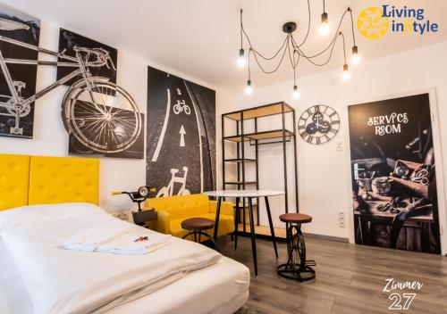 a bedroom with a bed and a table and chairs at Living inStyle in Krems an der Donau