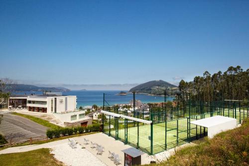 a building with a view of the ocean at Hotel Ego in Viveiro