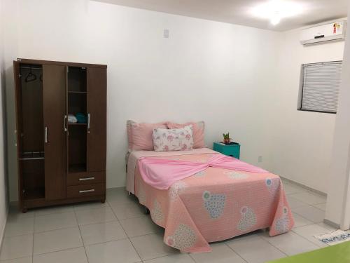 Katil atau katil-katil dalam bilik di Pousada Sol Nascente
