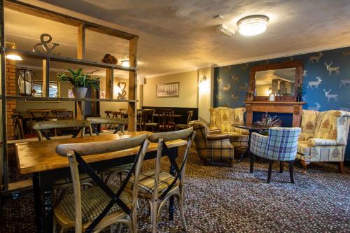 Χώρος καθιστικού στο The Windmill Inn