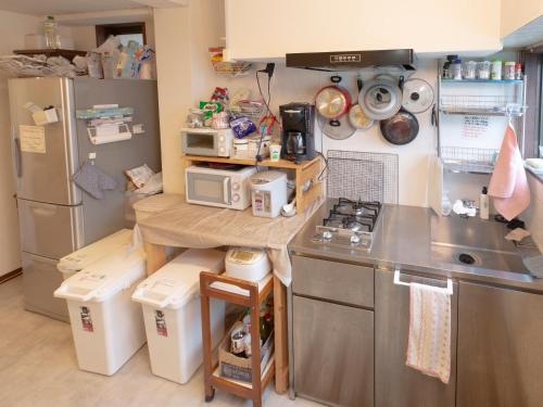 Dapur atau dapur kecil di Guesthouse Sensu