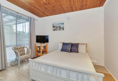 Posteľ alebo postele v izbe v ubytovaní Port Willunga Ocean Views Beachhouse