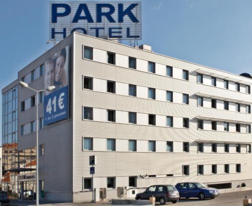 
a large building with a sign on the side of it at Park Hotel Porto Gaia in Vila Nova de Gaia
