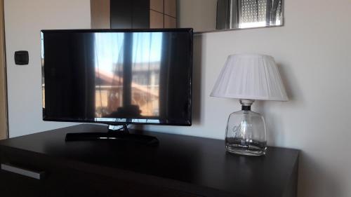 TV a/nebo společenská místnost v ubytování Il Brindisi di C & C Castelli Romani