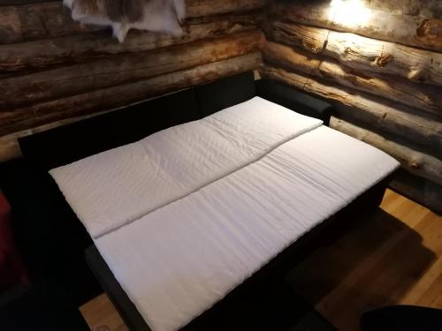 Postel nebo postele na pokoji v ubytování Rantaruka Apartment II