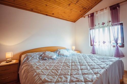 Posteľ alebo postele v izbe v ubytovaní Apartment Luciana 1