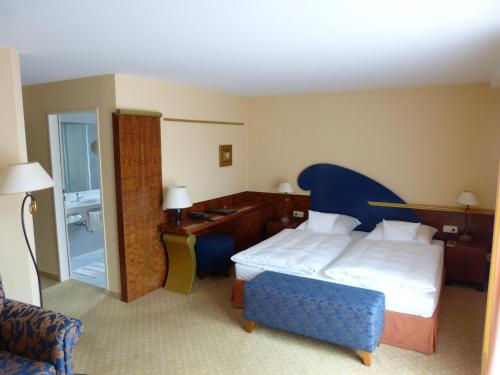 Giường trong phòng chung tại Hotel Roshop