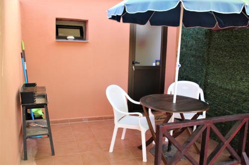 Patio alebo iná vonkajšia časť ubytovania Tamaragua Beach Studio