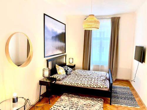 Ένα ή περισσότερα κρεβάτια σε δωμάτιο στο Urban City Retreat - by Nahuen Suites