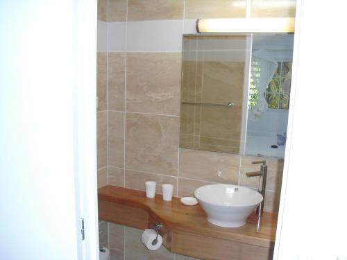 Et badeværelse på Coco-Mango Apt B
