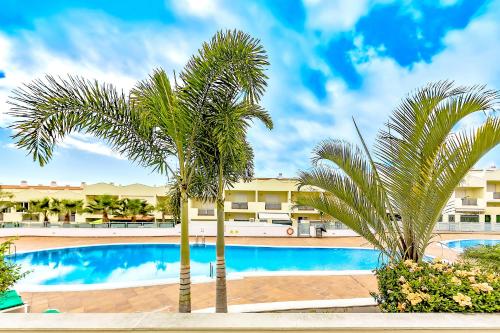Luxury Townhouse Oasis Fanabe (3 bedrooms) tesisinde veya buraya yakın yüzme havuzu