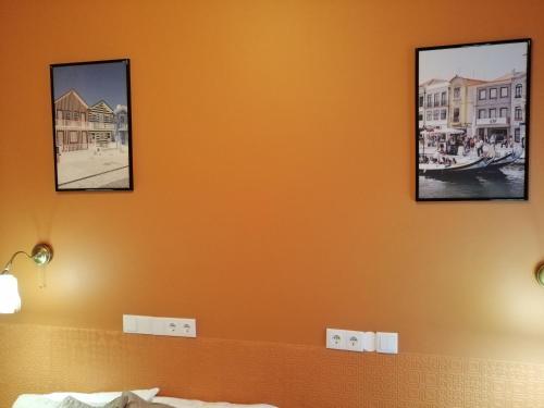 Ένα ή περισσότερα κρεβάτια σε δωμάτιο στο Plena Vita RESIDENCE
